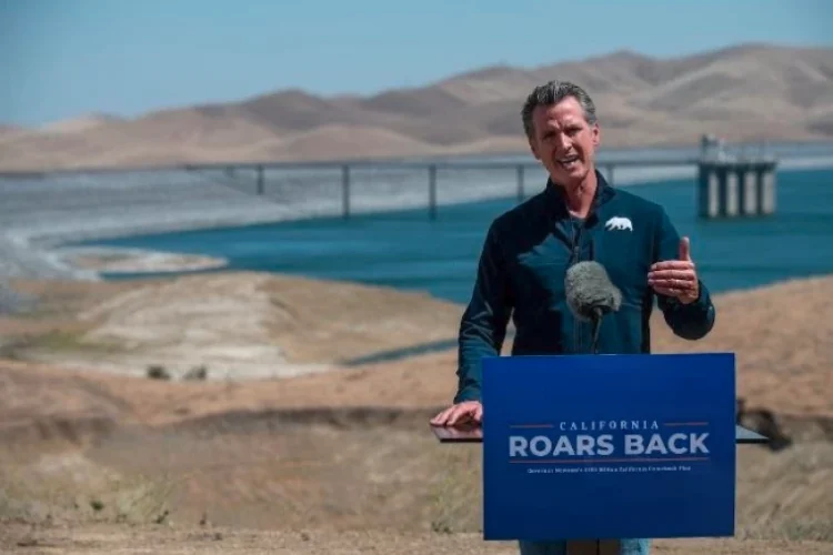California Governor Gavin Newsom speaks at a press conference near San Luis Reservoir in Merced County, California. 